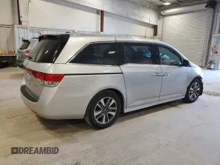 2014 Honda Odyssey Touring with VIN 5FNRL5H97EB005977, listed as a Copart auction lot 53849025 with 229,915 mi miles and Non Repairable. Bid and sale history available at DreamBid. Image 3.