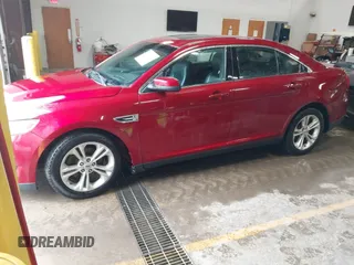 2013 Ford Taurus SEL with VIN 1FAHP2E99DG180535, listed as a IAAI auction lot 41741619 with 193,665 mi miles and . Bid and sale history available at carsss.com. Image 2.