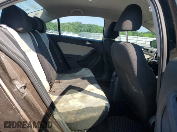 2015 Volkswagen Jetta S z VIN 3VW1K7AJ0FM285624, wystawiony jako Copart lot #62744225 z przebiegiem 96 183 mil mil oraz Czysty tytuł • Clean title. Historia ofert i sprzedaży dostępna na DreamBid. Obrazek 10.