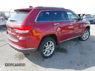 2014 Jeep Grand Cherokee Summit with VIN 1C4RJFJG6EC328516, listed as a IAAI auction lot 40698068 with 195,798 mi miles and . Bid and sale history available at DreamBid. Image 4.