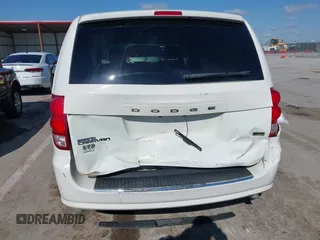 2013 Dodge Grand Caravan SXT with VIN 2C4RDGCG2DR522136, listed as a IAAI auction lot 42023561 with 176,635 mi miles and . Bid and sale history available at DreamBid. Image 6.