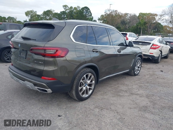 2022 BMW X5 xDrive45e z VIN 5UXTA6C00N9L06383, wystawiony jako IAAI lot #38552162 z przebiegiem 19 592 mil mil oraz . Historia ofert i sprzedaży dostępna na DreamBid. Obrazek 4.