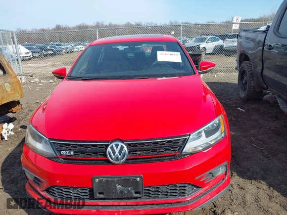 2016 Volkswagen Jetta Sedan 2.0T GLI SE with VIN 3VW5T7AJ0GM357177, listed as a IAAI auction lot 41769034 with 127,324 mi miles. Bid and sale history available at carsss.com. Image 12.