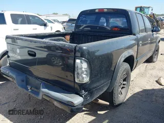 2003 Dodge Dakota Sport with VIN 1D7HL38X63S228581, listed as a IAAI auction lot 41835200 with 273,562 mi miles and . Bid and sale history available at DreamBid. Image 4.