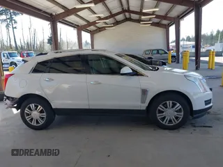 2015 Cadillac SRX Luxury Collection with VIN 3GYFNEE35FS573256, listed as a IAAI auction lot 41965935 with 79,207 mi miles. Bid and sale history available at carsss.com. Image 13.