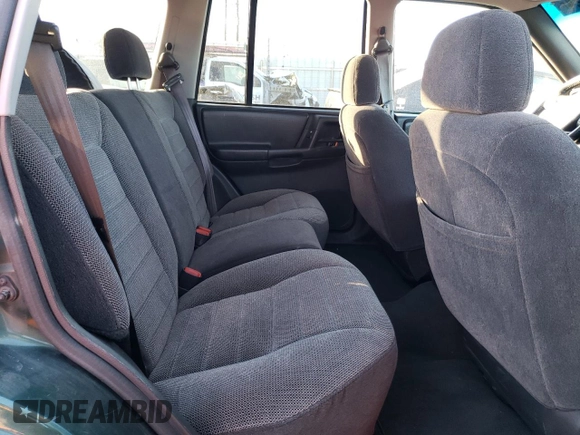 1997 Jeep Grand Cherokee Laredo with VIN 1J4GZ58Y6VC647434, listed as a Copart auction lot 73496824 with 124,946 mi miles and Salvage Title. Bid and sale history available at carsss.com. Image 11.