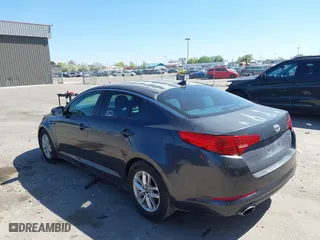 2011 Kia Optima LX with VIN KNAGM4A78B5066644, listed as a IAAI auction lot 42011172 with 172,862 mi miles. Bid and sale history available at carsss.com. Image 3.