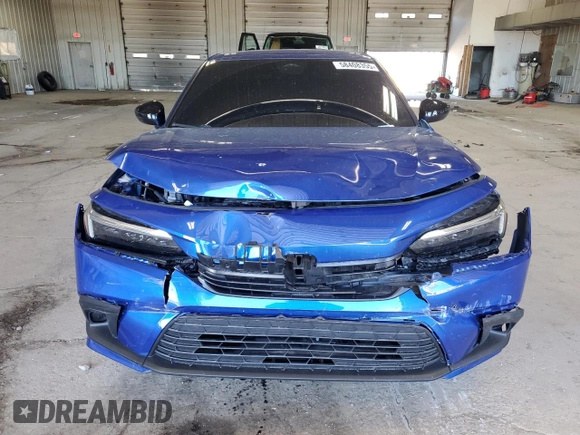 2023 Honda Civic Sport with VIN 2HGFE2F56PH562387, listed as a Copart auction lot 58408355 with 27,060 mi miles and Salvage title. Bid and sale history available at DreamBid. Image 5.
