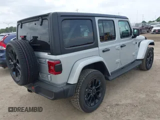 2023 Jeep Wrangler Sahara with VIN 1C4JJXP62PW627455, listed as a IAAI auction lot 42115137 with 62,143 mi miles and . Bid and sale history available at carsss.com. Image 4.