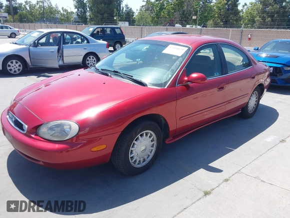 1997 Mercury Sable GS z VIN 1MELM50U6VG651910, wystawiony jako IAAI lot #42494879 z przebiegiem 70 304 mil mil oraz . Historia ofert i sprzedaży dostępna na DreamBid. Obrazek 2.