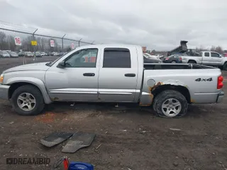 2006 Dodge Dakota SLT with VIN 1D7HW48N76S639553, listed as a IAAI auction lot 41810258 with 140,745 mi miles. Bid and sale history available at carsss.com. Image 14.