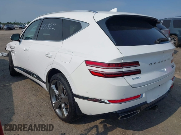 2022 Genesis GV80 with VIN KMUHCESC6NU084725, listed as a IAAI auction lot 42423446 with 66,562 mi miles and . Bid and sale history available at DreamBid. Image 3.