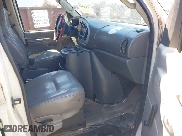 2003 Ford Econoline Cargo with VIN 1FTRE14W03HB60401, listed as a IAAI auction lot 41852847 with 325,883 mi miles. Bid and sale history available at carsss.com. Image 5.