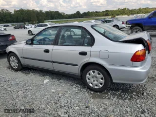1999 Honda Civic DX with VIN 1HGEJ662XXL027828, listed as a Copart auction lot 72623664 with 133,302 mi miles and Salvage Title. Bid and sale history available at carsss.com. Image 2.