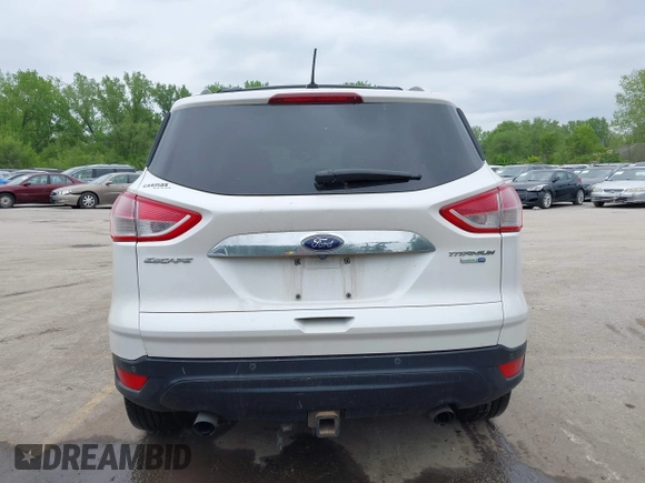 2016 Ford Escape Titanium with VIN 1FMCU9J96GUB97564, listed as a IAAI auction lot 42137663 with 269,009 mi miles. Bid and sale history available at carsss.com. Image 16.