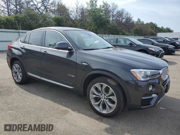 2018 BMW X4 xDrive28i with VIN 5UXXW3C56J0Z60753, listed as a Copart auction lot 60642114 with 34,074 mi miles and Salvage Title. Bid and sale history available at carsss.com. Image 4.