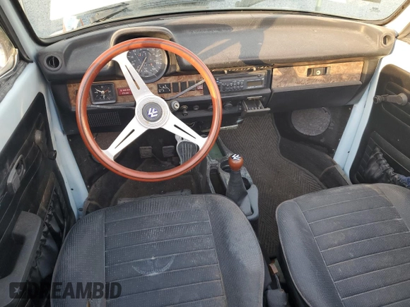 1979 Volkswagen Beetle with VIN 1592031742, listed as a Copart auction lot 77628044 with 93,929 mi miles and Salvage Title. Bid and sale history available at DreamBid. Image 8.