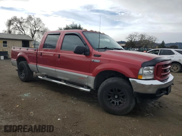 2003 Ford Super Duty F-250 XL with VIN 1FTNW20S33EA19960, listed as a Copart auction lot 85961314 with 268,112 mi miles and Salvage Title. Bid and sale history available at carsss.com. Image 4.