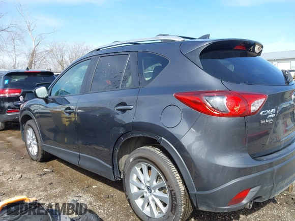 2016 Mazda CX-5 Touring with VIN JM3KE4CY9G0915305, listed as a IAAI auction lot 41840519 with 188,702 mi miles and . Bid and sale history available at carsss.com. Image 6.