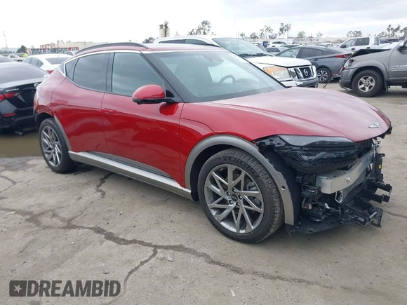 2023 Genesis GV60 Advanced z VIN KMUKCDTC9PU017098, wystawiony jako IAAI lot #41787572 z przebiegiem 1 685 mil mil oraz . Historia ofert i sprzedaży dostępna na DreamBid. Obrazek 1.