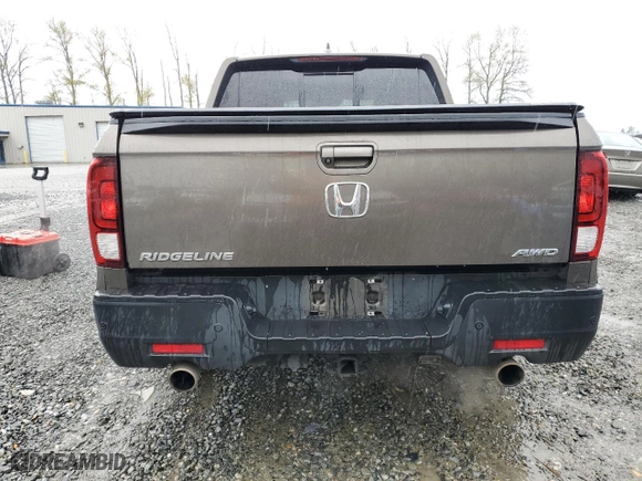2021 Honda Ridgeline RTL-E with VIN 5FPYK3F78MB016027, listed as a Copart auction lot 52218845 with 67,428 mi miles and Salvage Title. Bid and sale history available at carsss.com. Image 6.