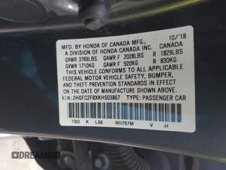 2019 Honda Civic Sport with VIN 2HGFC2F8XKH503867, listed as a IAAI auction lot 41533506 with 66,650 mi miles and . Bid and sale history available at DreamBid. Image 9.