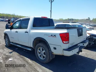 2012 Nissan Titan SV with VIN 1N6AA0EC0CN307743, listed as a IAAI auction lot 42085082 with 187,506 mi miles. Bid and sale history available at carsss.com. Image 3.