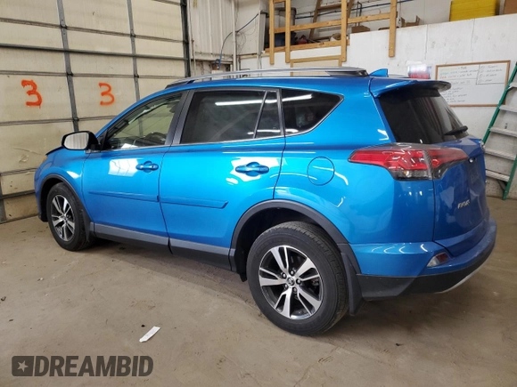 2018 Toyota RAV4 XLE with VIN JTMRFREV2JD234746, listed as a Copart auction lot 52576205 with 0 mi miles and Salvage Title. Bid and sale history available at carsss.com. Image 2.