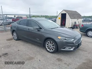2017 Ford Fusion Energi SE with VIN 3FA6P0PU9HR227932, listed as a IAAI auction lot 42177500 with 106,938 mi miles. Bid and sale history available at carsss.com. Image 1.