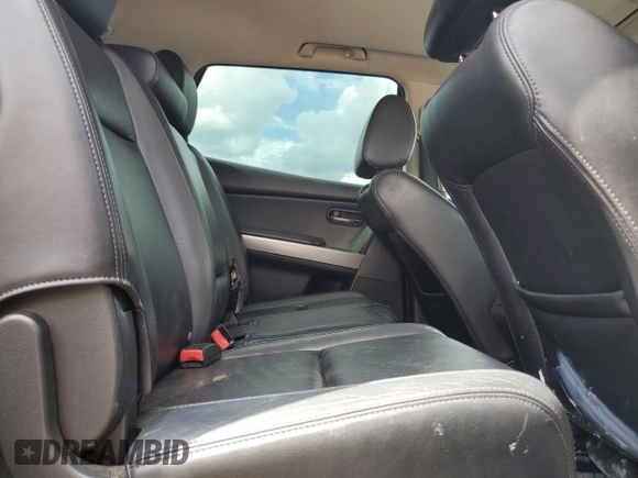 2012 Mazda CX-9 Grand Touring z VIN JM3TB2DAXC0358272, wystawiony jako Copart lot #60703665 z przebiegiem 278 558 mil mil oraz Szkoda całkowita • Salvage title. Historia ofert i sprzedaży dostępna na DreamBid. Obrazek 11.