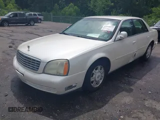 2003 Cadillac DeVille z VIN 1G6KD54Y03U182728, wystawiony jako IAAI lot #42080577 z przebiegiem 193 152 mil mil oraz . Historia ofert i sprzedaży dostępna na DreamBid. Obrazek 2.