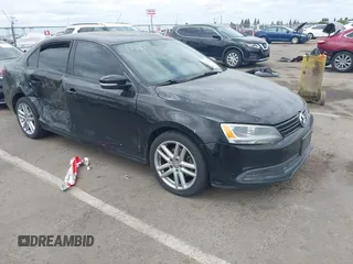 2011 Volkswagen Jetta Sedan SE PZEV with VIN 3VWDZ7AJ5BM308687, listed as a IAAI auction lot 42127389 with 155,419 mi miles. Bid and sale history available at carsss.com. Image 1.