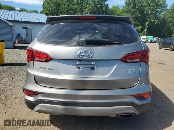 2018 Hyundai Santa Fe 2.4L с VIN 5NMZTDLB0JH088455, выставлен на аукционе Copart как лот 64725135 с пробегом 49 304 миль миль и Списание • Salvage title. История ставок и продаж доступна на DreamBid. Изображение 6.