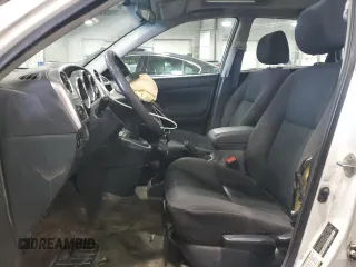 2008 Toyota Matrix STD with VIN 2T1KR32E38C699991, listed as a Copart auction lot 51363995 with 299,999 mi miles and Salvage Title. Bid and sale history available at DreamBid. Image 7.