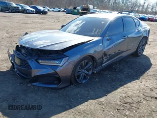 2023 Acura TLX w/A-Spec Package z VIN 19UUB5F54PA001072, wystawiony jako IAAI lot #41695592 z przebiegiem 17 218 mil mil oraz . Historia ofert i sprzedaży dostępna na DreamBid. Obrazek 2.