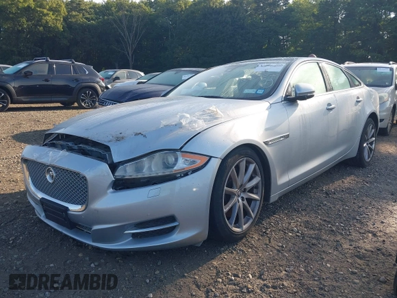 2011 Jaguar XJ with VIN SAJWA1CB1BLV05526, listed as a IAAI auction lot 40162505 with 56,961 mi miles and . Bid and sale history available at DreamBid. Image 2.