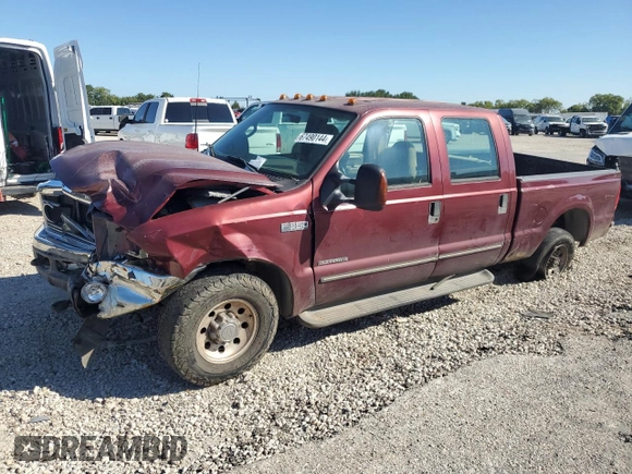 2000 Ford F-350 XL with VIN 1FTSW30F6YEB89796, listed as a Copart auction lot 67490144 with 517,242 mi miles and Salvage Title. Bid and sale history available at DreamBid. Image 1.