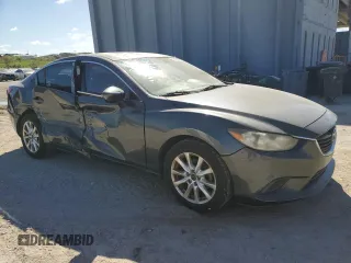2014 Mazda 6 i Sport with VIN JM1GJ1U63E1125737, listed as a Copart auction lot 48692865 with 106,518 mi miles and Salvage Title. Bid and sale history available at DreamBid. Image 4.