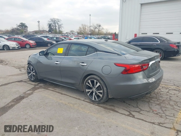 2017 Nissan Maxima S with VIN 1N4AA6AP1HC361740, listed as a IAAI auction lot 40868494 with 90,607 mi miles and . Bid and sale history available at DreamBid. Image 3.