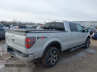 2011 Ford F-150 XLT with VIN 1FTFW1ET9BFB82704, listed as a IAAI auction lot 41238052 with 175,590 mi miles. Bid and sale history available at carsss.com. Image 4.