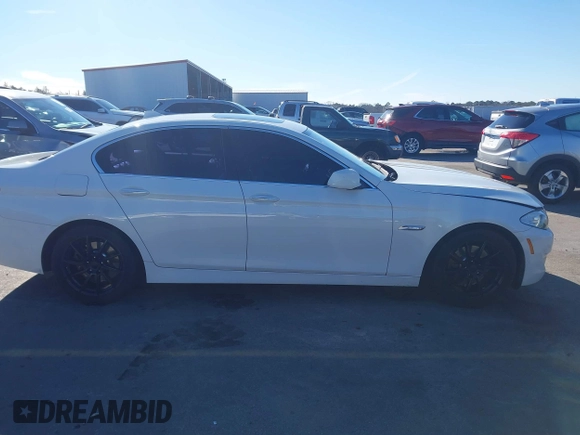 2013 BMW 5 Series 528i with VIN WBAXG5C53DD232909, listed as a IAAI auction lot 41620696 with 181,375 mi miles and . Bid and sale history available at carsss.com. Image 13.