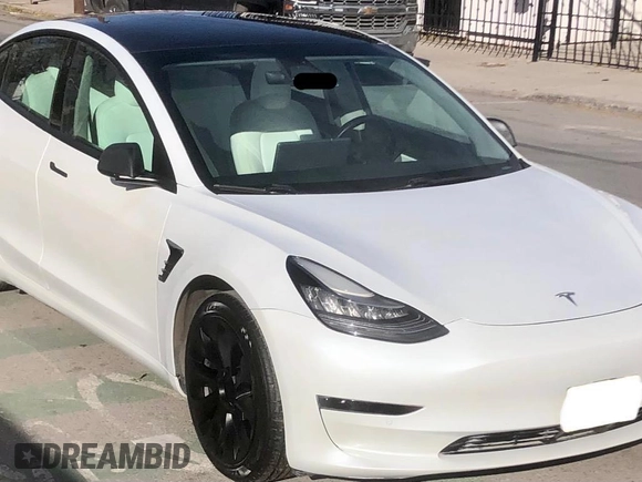 2021 Tesla Model 3 Standard Range Plus with VIN 5YJ3E1EA2MF854372, listed as a Copart auction lot 56435825 with 44,637 mi miles and Salvage Title. Bid and sale history available at DreamBid. Image 1.