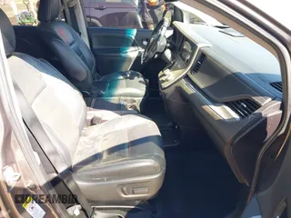 2015 Toyota Sienna SE with VIN 5TDXK3DC3FS682327, listed as a IAAI auction lot 41983156 with 141,640 mi miles. Bid and sale history available at carsss.com. Image 5.