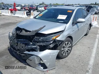 2021 Toyota Prius LE with VIN JTDKAMFP1M3180370, listed as a IAAI auction lot 41928512 with 83,249 mi miles and . Bid and sale history available at DreamBid. Image 18.