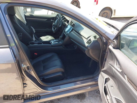 2019 Honda Civic EX-L z VIN 19XFC1F70KE205694, wystawiony jako IAAI lot #41976645 z przebiegiem 43 653 mil mil oraz . Historia ofert i sprzedaży dostępna na DreamBid. Obrazek 5.