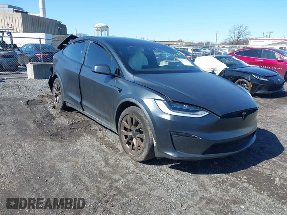2022 Tesla Model X with VIN 7SAXCDE52NF345835, listed as a IAAI auction lot 41823522 with 24,401 mi miles and . Bid and sale history available at DreamBid. Image 1.