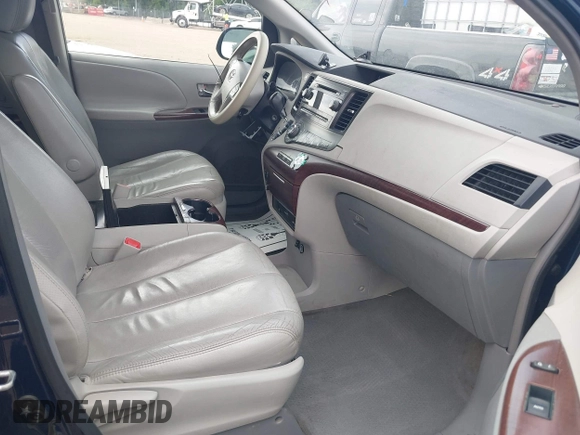 2011 Toyota Sienna XLE AAS with VIN 5TDYK3DC6BS045303, listed as a IAAI auction lot 42515203 with 205,904 mi miles and . Bid and sale history available at DreamBid. Image 5.
