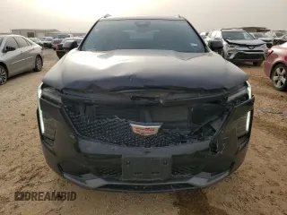 2024 Cadillac XT4 FWD Sport with VIN 1GYFZER46RF100076, listed as a Copart auction lot 45741285 with 11,616 mi miles and Salvage title. Bid and sale history available at DreamBid. Image 5.