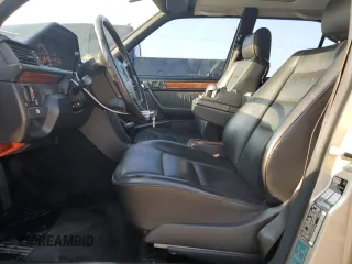 1993 Mercedes-Benz E Class with VIN WDBEA32E2PB985394, listed as a Copart auction lot 65040584 with 260,519 mi miles and Salvage Title. Bid and sale history available at carsss.com. Image 7.