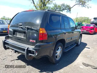 2005 GMC Envoy SLE z VIN 1GKDT13S452198027, wystawiony jako IAAI lot #42243258 z przebiegiem 144 240 mil mil oraz . Historia ofert i sprzedaży dostępna na DreamBid. Obrazek 4.